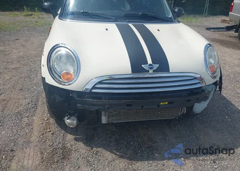 2010 Mini Cooper z USA, uszkodzony, nr VIN WMWMF3C50ATZ26274